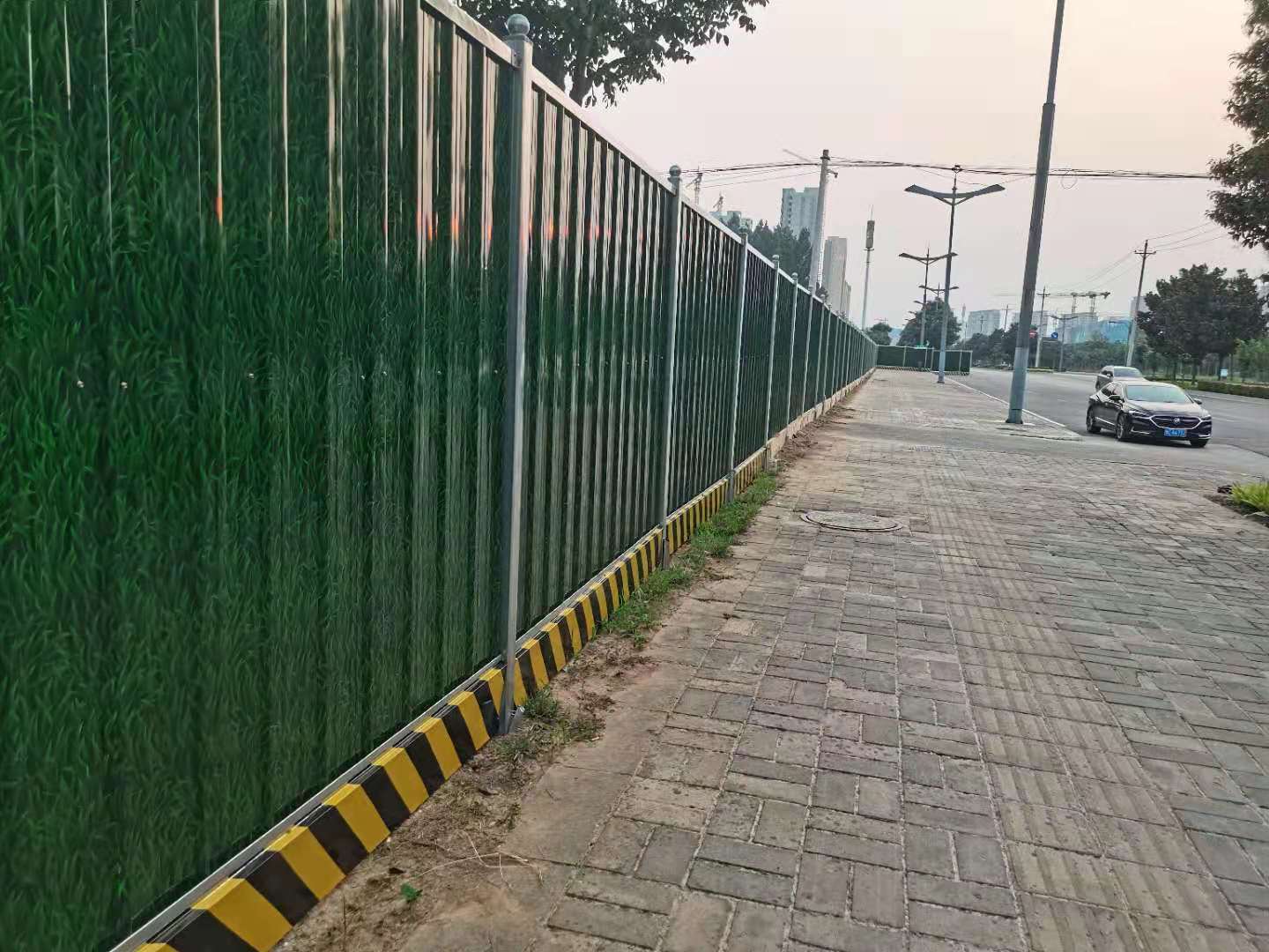 洛阳市洛龙区古城路装置彩钢围挡-amjs澳金沙门线路首页实业洛阳围挡厂家