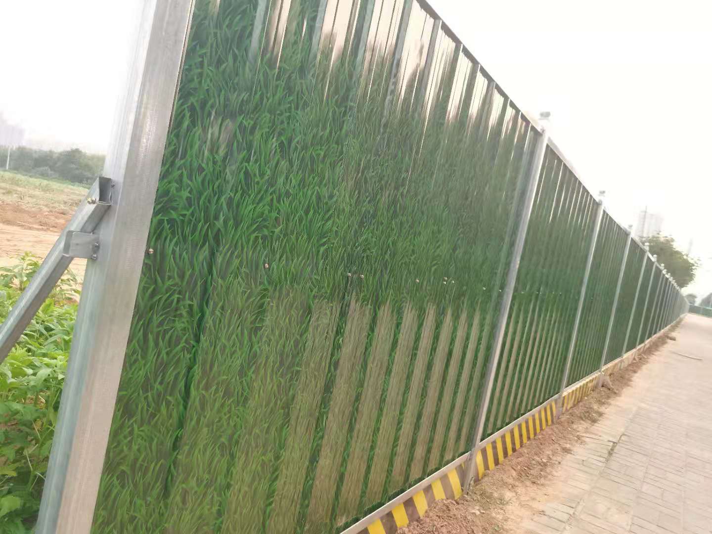 洛阳市洛龙区古城路装置彩钢围挡-amjs澳金沙门线路首页实业洛阳围挡厂家